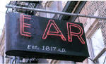 For decades, the neon sign in front of the Ear Inn flashed "Bar."  To avoid landmarks review for any new sign, the ends of the "B" were painted over to rename the pub once only known as "The Green Door."  The new name came from the "Ear" music magazine published upstairs from 1975 to 1992.